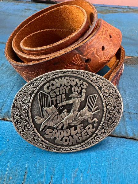 1981 VINTAGE BROWN LEATHER BELT WITH SILVER COWBOY BUCKLE