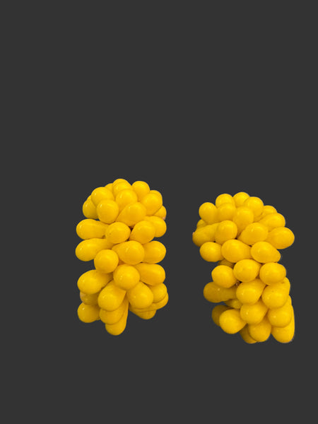 1940s yellow clip on earrings that belonged to Toyah