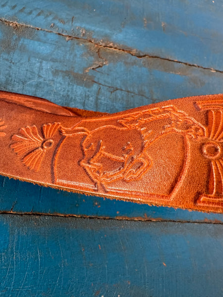1981 VINTAGE BROWN LEATHER BELT WITH SILVER COWBOY BUCKLE