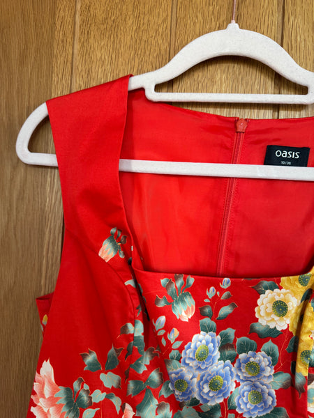 TOYAH ORANGE AND BLACK STAGE DRESS