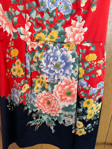 TOYAH ORANGE AND BLACK STAGE DRESS