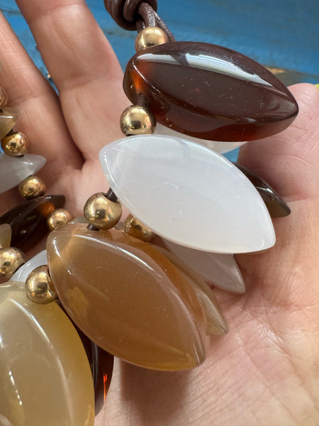 VINTAGE TRIPLE STRAND BROWNS AND WHITE LUCITE PENDANTS NECKLACE