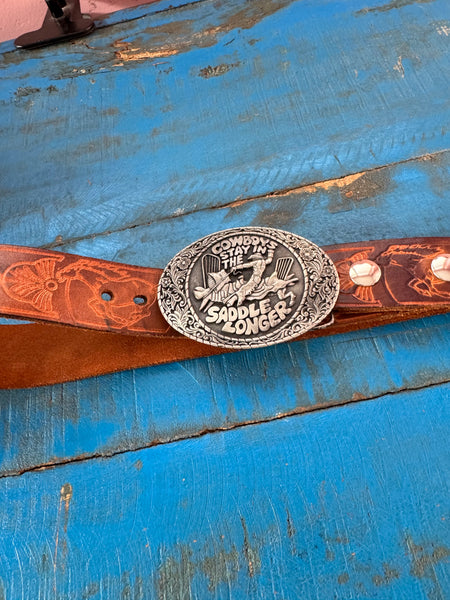 1981 VINTAGE BROWN LEATHER BELT WITH SILVER COWBOY BUCKLE