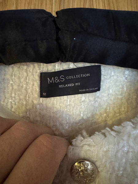 Marks and Spencer Collection label on a cream boucle size 12 jacket 